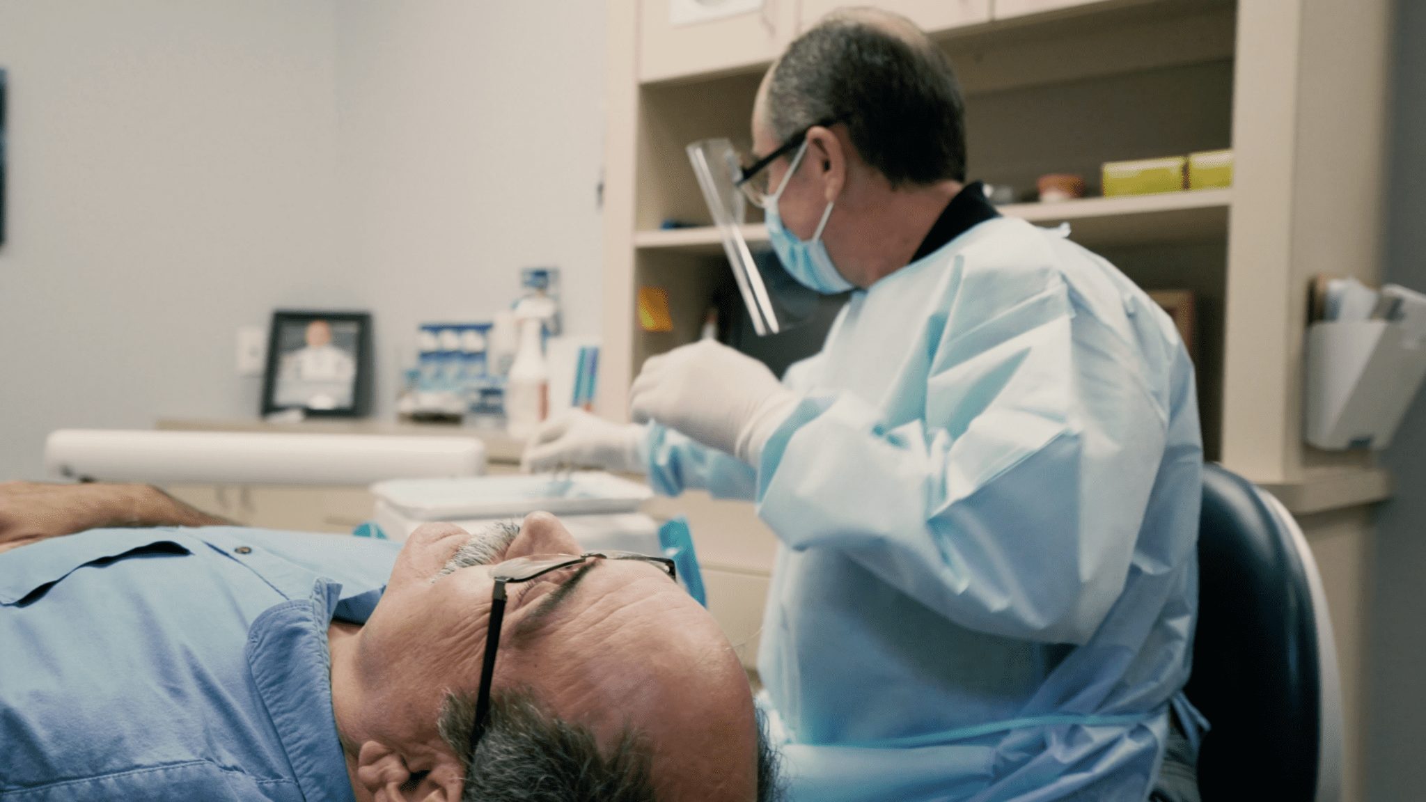 Dr. Nazari treating a dental patient